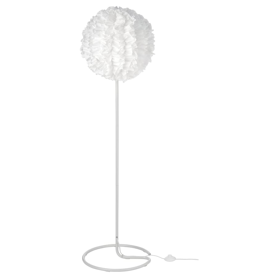 White floor lamp with a spherical lampshade on a white background