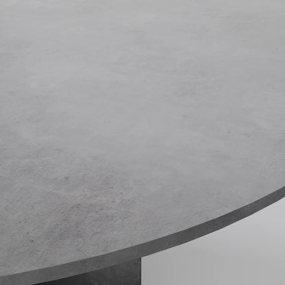 The Monolith Round Table: Modern Brutalist Centerpiece in Textured Grey Stone
