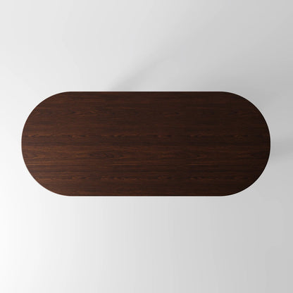 Architectural Oval Dining Table featuring Concrete Supports with Circular Voids