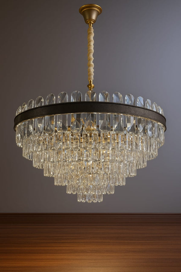 Chandelier hanging against a gray wall with wooden floor