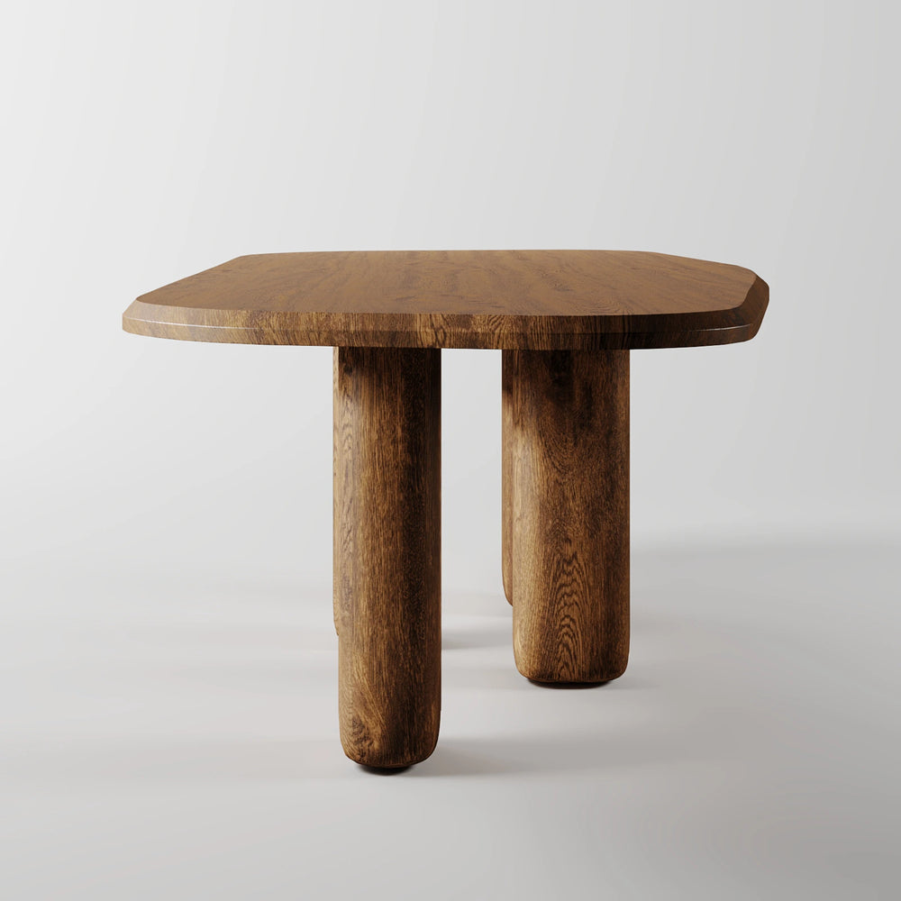 The Aurum Pillar Table: Modern Marble Top with Three Gleaming Brass-Tone Supports