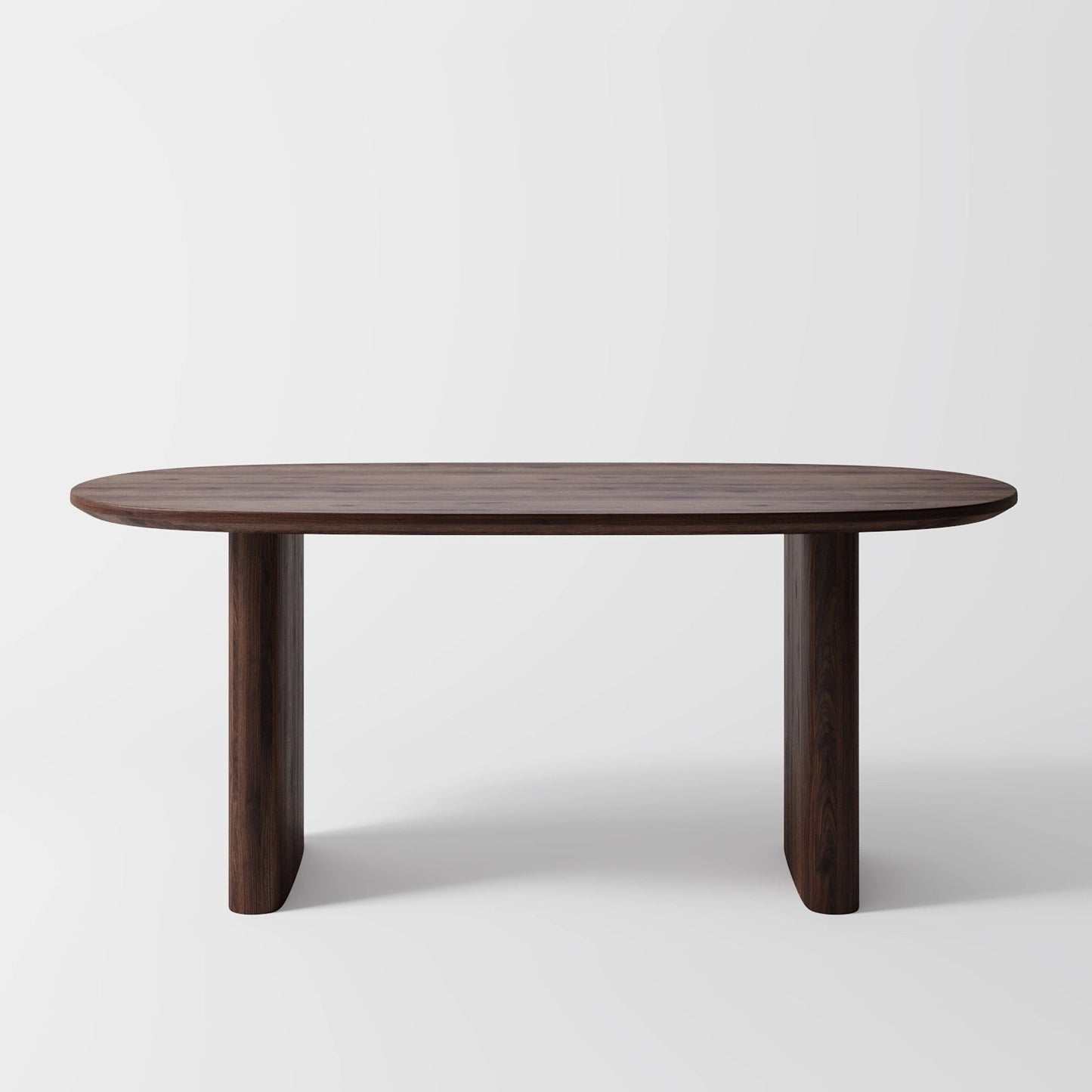 Architectural Elliptical Dining Table with Bold Monolithic Supports