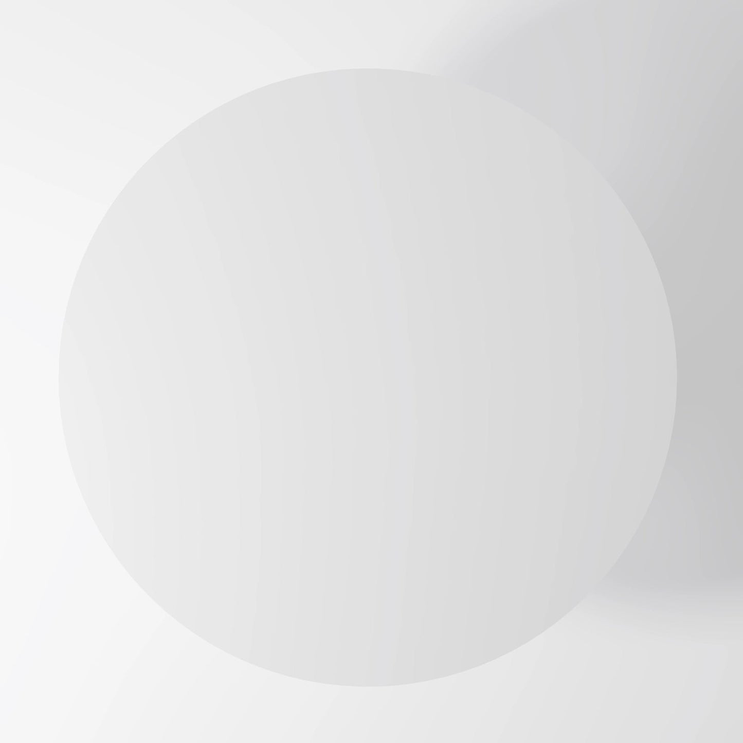 The Monolith Round Table: Modern Brutalist Centerpiece in Textured Grey Stone