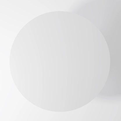 The Monolith Round Table: Modern Brutalist Centerpiece in Textured Grey Stone