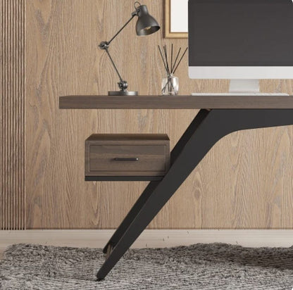 Close-up of the Axel desk angled black metal leg and floating drawer