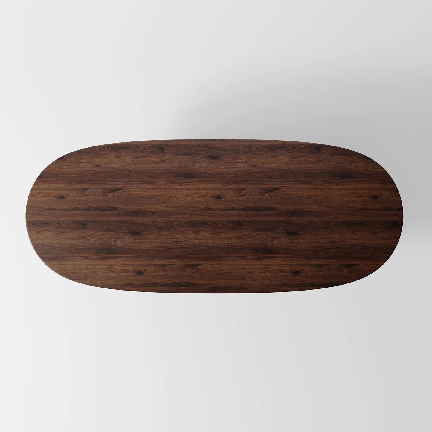 Architectural Elliptical Dining Table with Bold Monolithic Supports