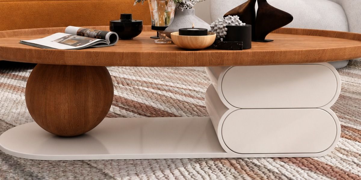 Close-up of the Pebble coffee table sphere leg and rounded cream base