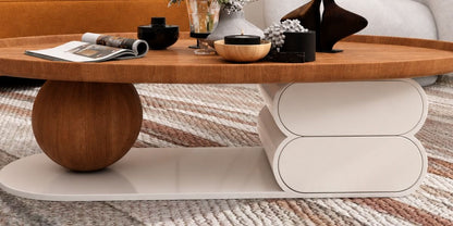 Close-up of the Pebble coffee table sphere leg and rounded cream base