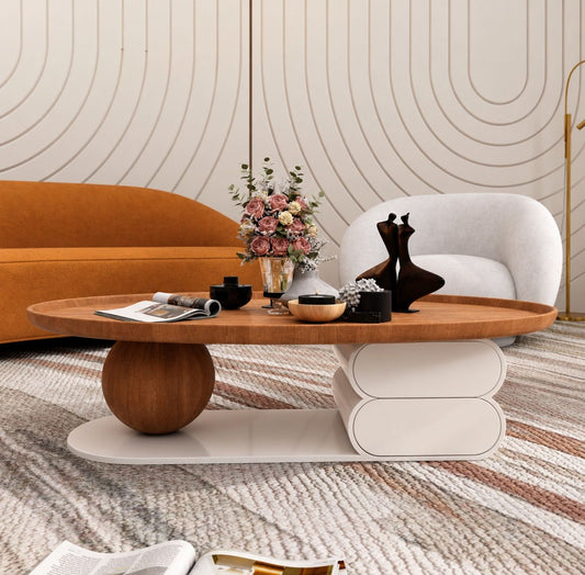 Pebble oval coffee table 130cm with wood-tone top, sphere leg and cream base — RoomVibe Dubai