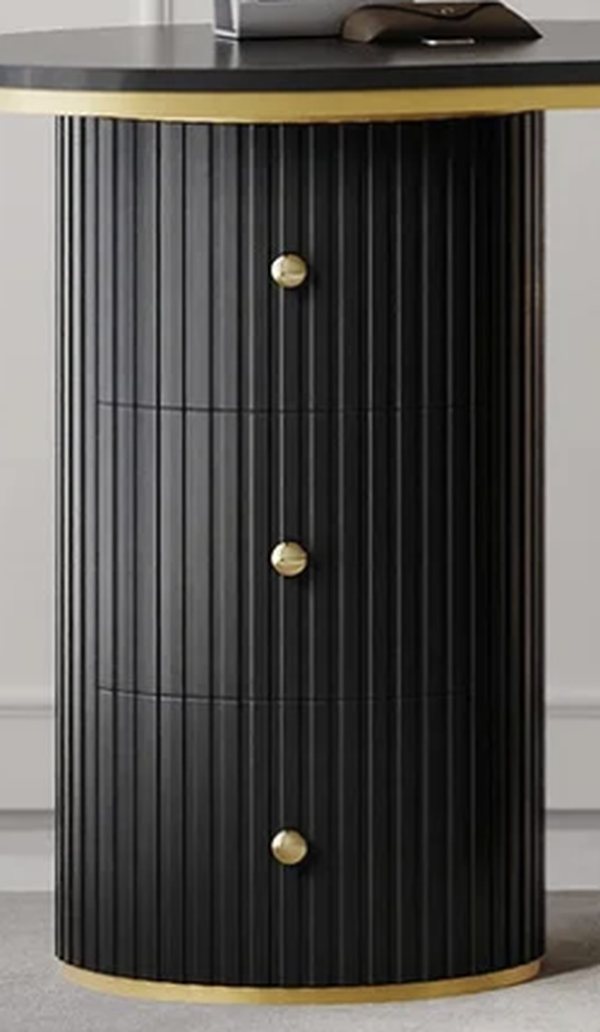 Close-up of the Kira desk drawer pedestal with gold knobs and gold base trim