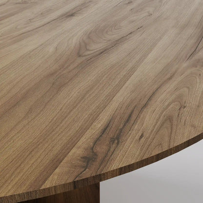 The Monolith Round Table: Modern Brutalist Centerpiece in Textured Grey Stone