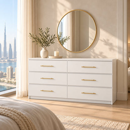 Isla white 6-drawer dresser with round gold mirror in a Dubai bedroom