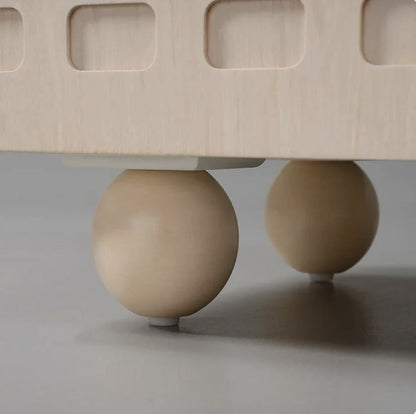 Close-up of Miro TV unit solid wood ball feet