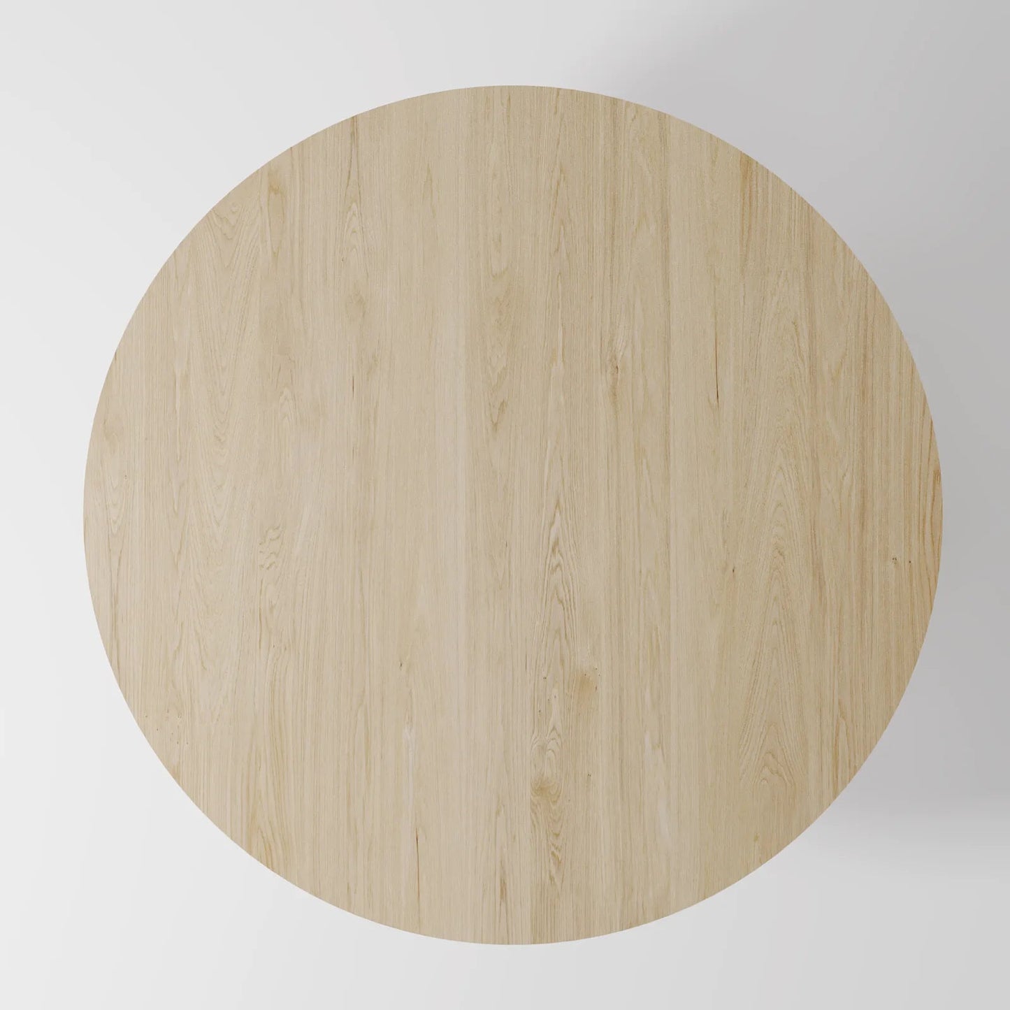 The Monolith Round Table: Modern Brutalist Centerpiece in Textured Grey Stone