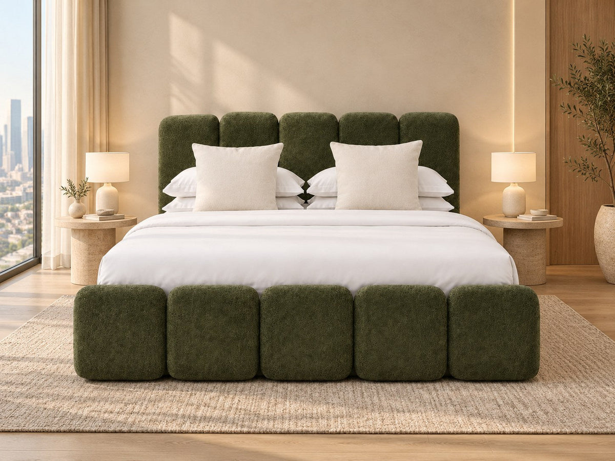 Verde olive green upholstered king bed with rounded panel headboard in a bright Dubai apartment bedroom — RoomVibe