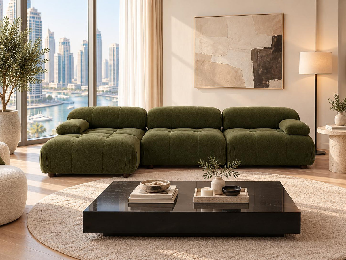 Green modular sectional sofa in a Dubai Marina apartment living room